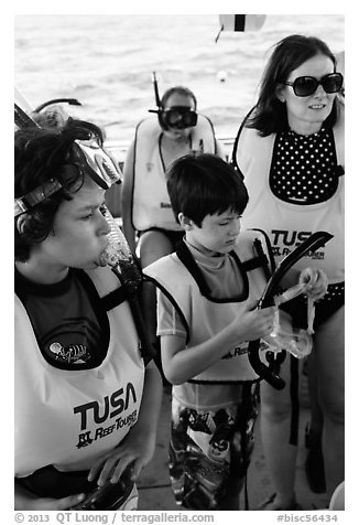 Family preparing for snorkeling. Biscayne National Park (black and white)