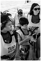 Family preparing for snorkeling. Biscayne National Park ( black and white)