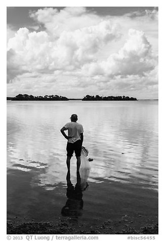 Fisherman holding net. Biscayne National Park (black and white)