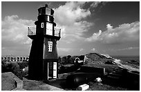 Fort Jefferson lighthouse overlooking Ocean,  early morning. Dry Tortugas National Park, Florida, USA. (black and white)