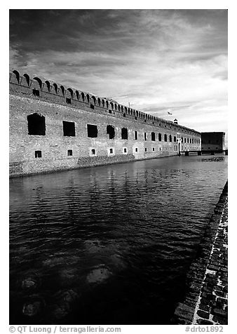 Fort Jefferson moat and thick brick walls. Dry Tortugas National Park (black and white)