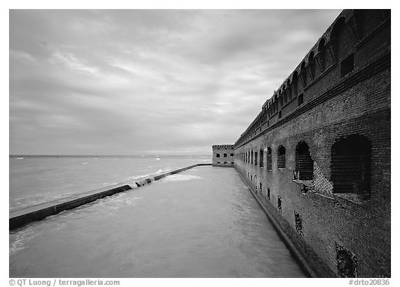Fort Jefferson wall overlooking the ocean, cloudy weather. Dry Tortugas  National Park (black and white)
