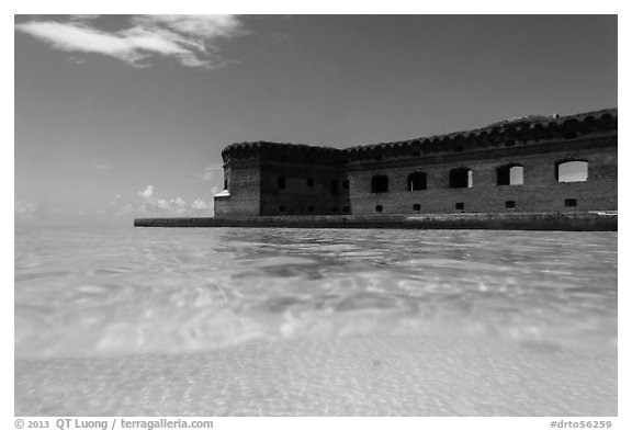 Split view of Fort Jefferson and clear sandy bottom. Dry Tortugas National Park (black and white)