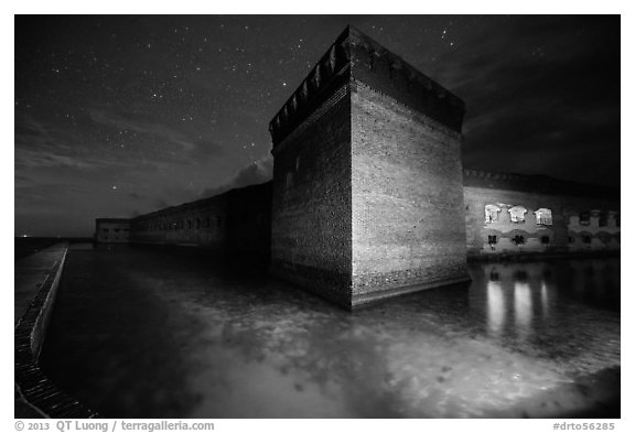 Fort Jefferson corner turret and moat at night. Dry Tortugas National Park (black and white)