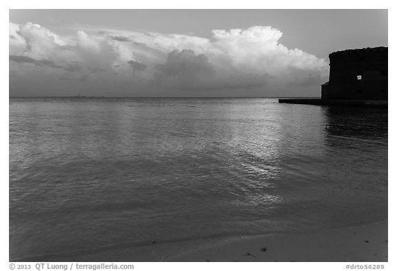 Tropical clouds, beach, and fort at sunrise. Dry Tortugas National Park (black and white)