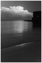 Beach, cloud and fort at sunrise. Dry Tortugas National Park, Florida, USA. (black and white)