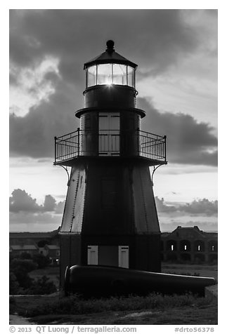 Harbor Light and gun at sunset. Dry Tortugas National Park (black and white)