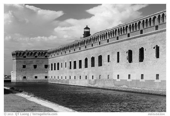 Moat, wall, and Harbor Light. Dry Tortugas National Park (black and white)