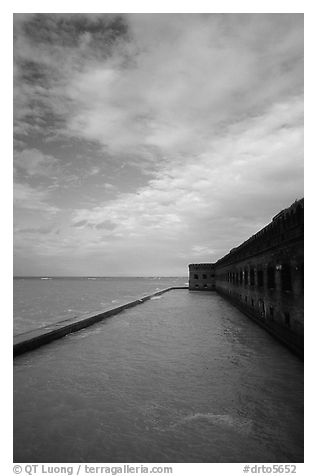 Sky, seawall and moat on windy day. Dry Tortugas National Park (black and white)