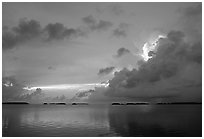 Clearing storm on Florida Bay seen from the Keys, sunset. Everglades National Park, Florida, USA. (black and white)