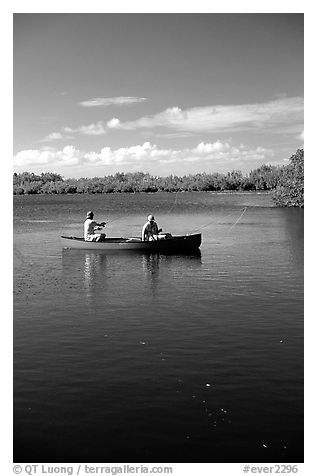 Fishing from a red canoe. Everglades National Park (black and white)