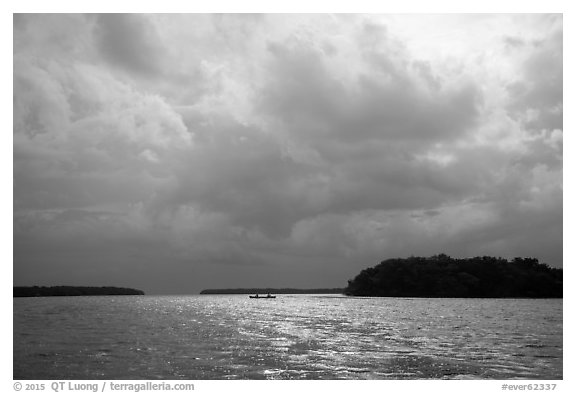 Storm clouds and canoe, Florida Bay. Everglades National Park (black and white)