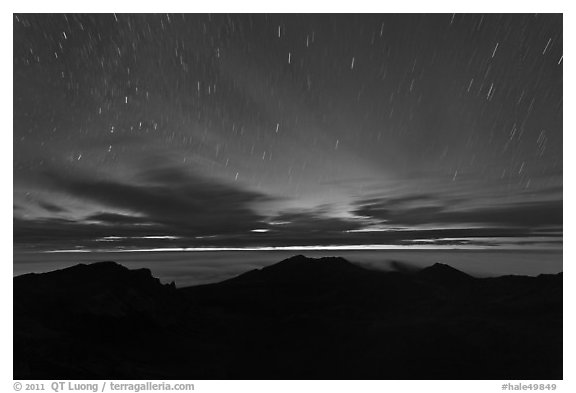 Crater ridge and stars in motion at night. Haleakala National Park (black and white)