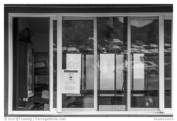 Parking lot and mountain, Kipahulu Visitor Center window reflexion. Haleakala National Park (black and white)