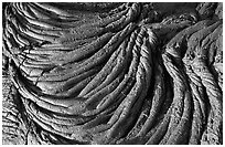 Rope-like hardened pahoehoe lava. Hawaii Volcanoes National Park ( black and white)