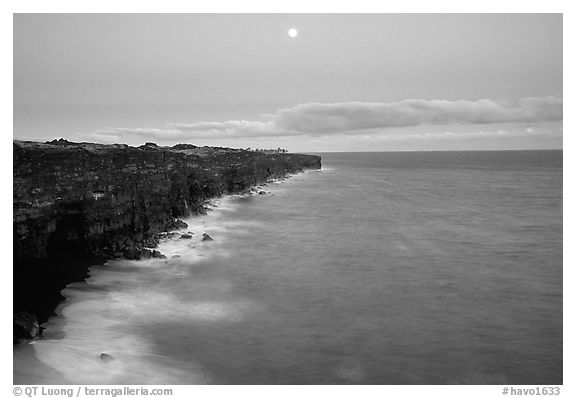 Holei Pali cliffs and moon at dusk. Hawaii Volcanoes National Park (black and white)