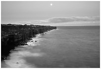 Holei Pali cliffs and moon at dusk. Hawaii Volcanoes National Park ( black and white)