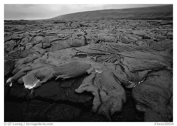Live lava flow at dusk near the end of Chain of Craters road. Hawaii Volcanoes National Park (black and white)