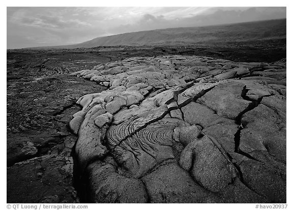 Fresh lava with cracks showing molten lava underneath. Hawaii Volcanoes National Park (black and white)