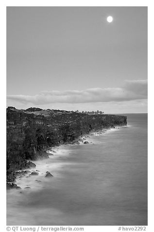 Holei Pali volcanic cliffs and moon at dusk. Hawaii Volcanoes National Park (black and white)