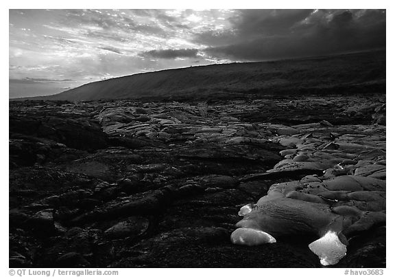 Live lava advancing at sunset. Hawaii Volcanoes National Park (black and white)
