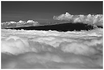 Mauna Loa emerging above clouds. Hawaii Volcanoes National Park ( black and white)