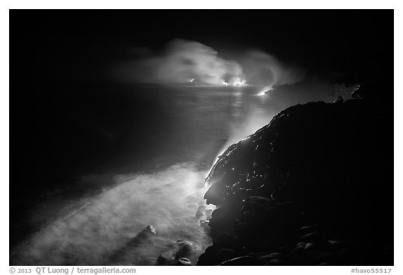Streams of lava flow into Pacific Ocean. Hawaii Volcanoes National Park (black and white)