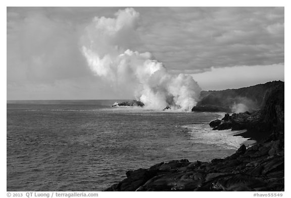 Billowing coastal smoke plume carries toxic sulphur dioxide as lava enters Pacific Ocean. Hawaii Volcanoes National Park (black and white)
