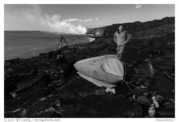 Photographer camping near lava ocean entry. Hawaii Volcanoes National Park (black and white)