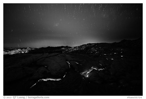 Molten lava flow with star trails. Hawaii Volcanoes National Park (black and white)