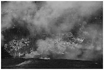 Lava fountains from lava lake in Halemaumau crater. Hawaii Volcanoes National Park ( black and white)