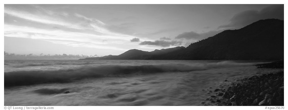 Wave and coastal hills at dawn, Tutuila Island. National Park of American Samoa (black and white)