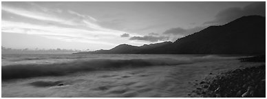 Wave and coastal hills at dawn, Tutuila Island. National Park of American Samoa (Panoramic black and white)