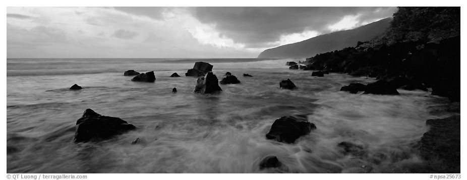 Dynamic seascape with boulders and surf, Tau Island. National Park of American Samoa (black and white)