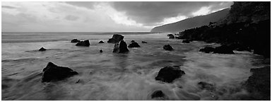 Dynamic seascape with boulders and surf, Tau Island. National Park of American Samoa (Panoramic black and white)