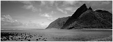 Pointed tropical peaks rising above turquoise waters, Ofu Island. National Park of American Samoa (Panoramic black and white)