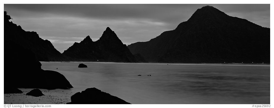 Bay with coastal peaks at dusk. National Park of American Samoa (black and white)