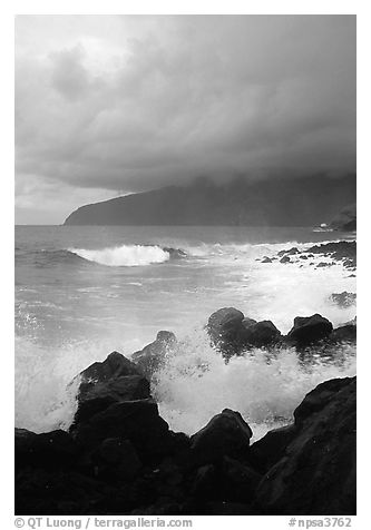 Stormy seascape with crashing waves and clouds, Siu Point, Tau Island. National Park of American Samoa (black and white)