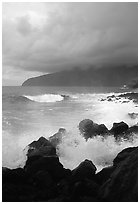 Stormy seascape with crashing waves and clouds, Siu Point, Tau Island. National Park of American Samoa ( black and white)