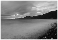 Approaching storm at sunrise, Vatia bay, Tutuila Island. National Park of American Samoa ( black and white)