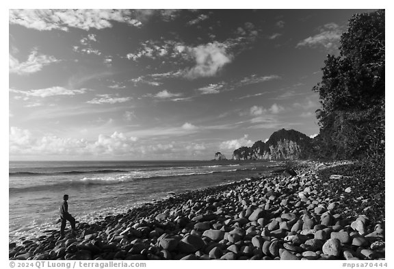 Visitor looking, Tuafanua Beach, Tuitula. National Park of American Samoa (black and white)