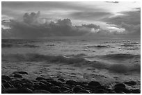 Boulders, surf, and clouds at sunrise. National Park of American Samoa ( black and white)