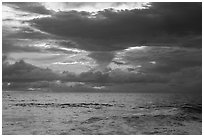 Tropical clouds at sunrise. National Park of American Samoa ( black and white)