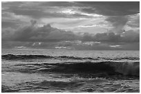 Surf and tropical clouds at sunrise from Tuitula Island. National Park of American Samoa ( black and white)