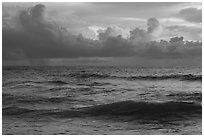 Set of waves and cloud formatins at sunrise. National Park of American Samoa ( black and white)