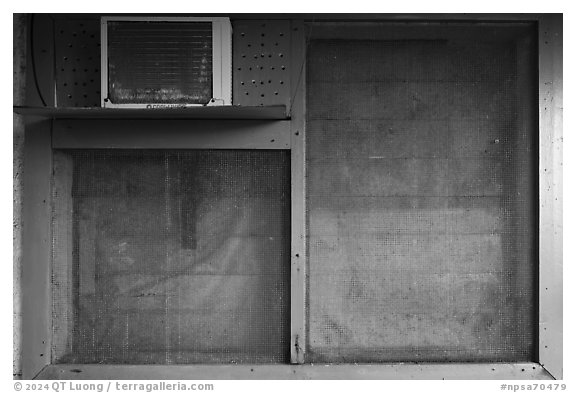 Ofu Ranger Station and Visitor Center window with air conditioning unit. National Park of American Samoa (black and white)