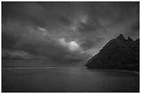 Tropical clouds and stars over Asaga Strait and Sunuitao Peak, Ofu Island. National Park of American Samoa ( black and white)