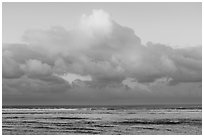 Tropical clouds over Asaga Strait and Pacific Ocean at sunrise, Ofu Island. National Park of American Samoa ( black and white)