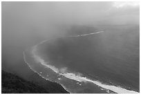 Ofu South Beach and ocean from mountain engulfed in clouds. National Park of American Samoa ( black and white)