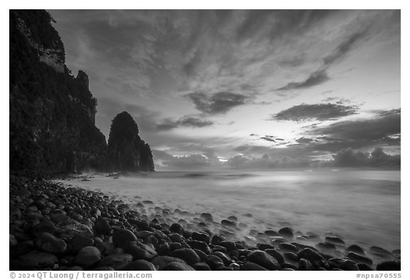 Pola Island, Boulders, surf, and clouds at sunrise. National Park of American Samoa (black and white)